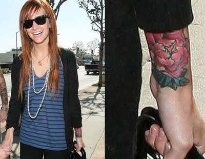 tattoo on her left wrist.