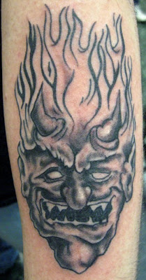 Monster Demon Head Tattoo with Flames