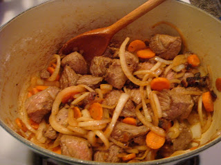 onions and carrots tossed with beef and flour