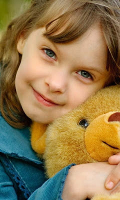 lovely-baby-with-teddy-bear