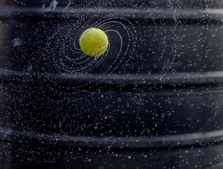 Spinning tennis ball