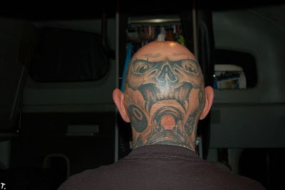 Strange bald head tattoos Seen On www.coolpicturesgallery.blogspot.com