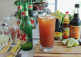 Food Lust People Love: A refreshing drink, spicy micheladas are made with cold beer, tomato juice, lime juice and lots of spicy seasonings. #SundaySupper