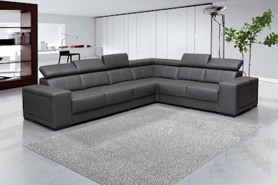 Sectional Sofa Upholstered in leather Placed in a Common Room