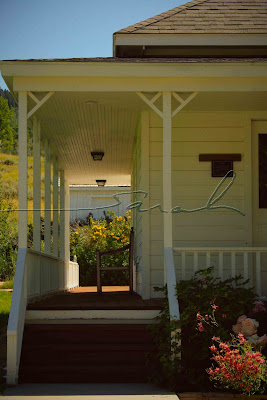 the porch of a beautiful country house