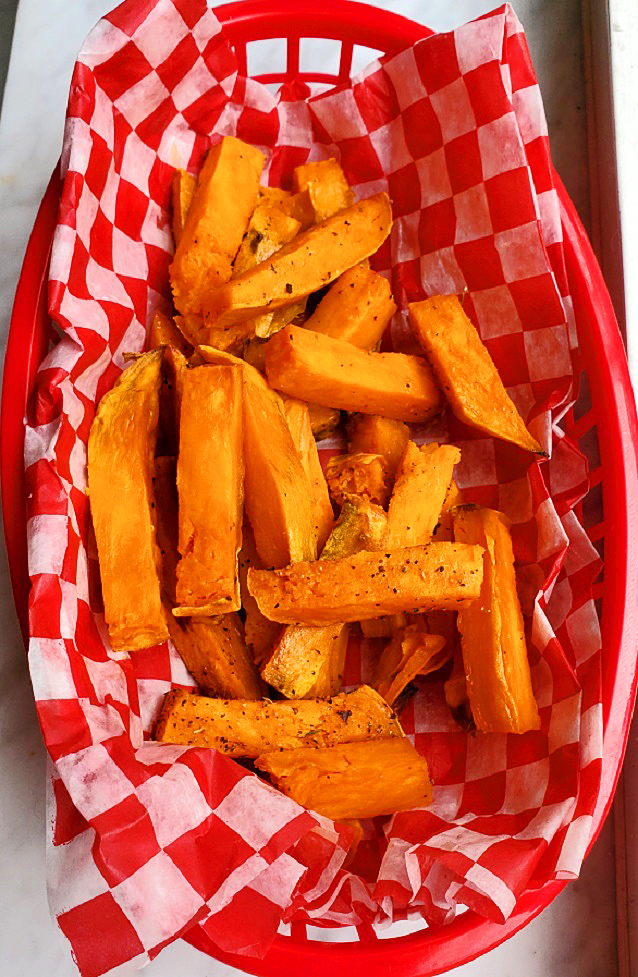 air fried sweet potato fries in a red basket
