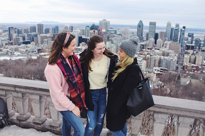 Three friends looking out over Mount Royale, Montreal, Quebec