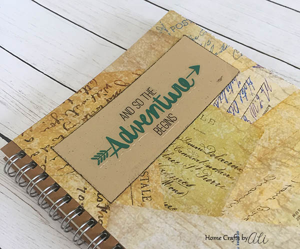Keep track of your travel adventures with this easy DIY notebook!