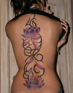 Flower Tattoo with Tribal Design on Back