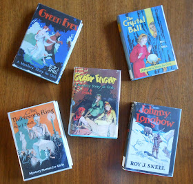 Image of five Roy Snell books from the collection