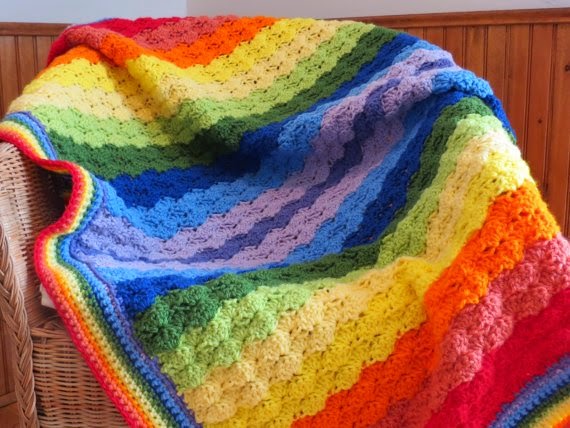 https://www.etsy.com/listing/188568303/colorful-handmade-crochet-rainbow-baby?ref=favs_view_4