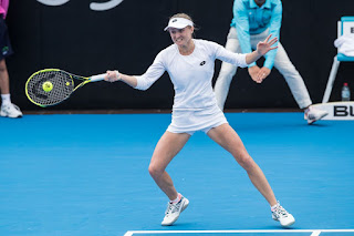 Aliaksandra Sasnovich in White Dress at 2019 Sydney International Tennis