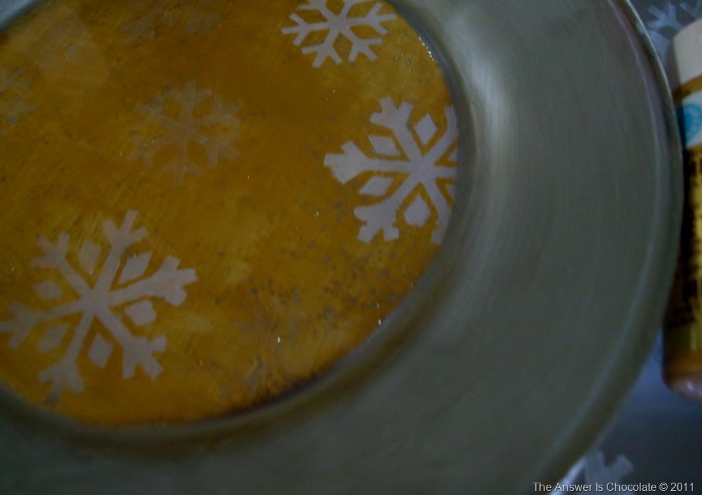 I painted on the underside of the plate again using the snowflake stencils