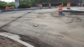 street milled of the top layer of asphalt in preparation for laying down the final coat