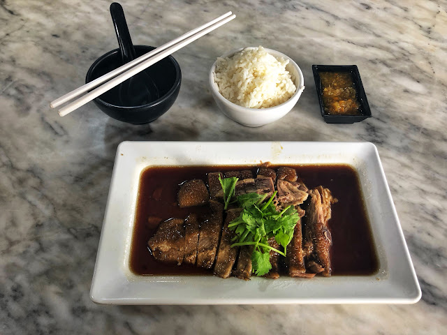 braised goose served with white rice and sour dipping sauce