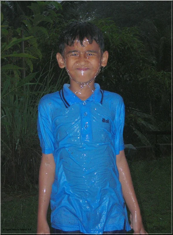 Muhammad Hanis in the rain 