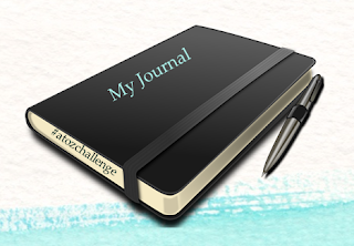 image journal with pen, #atozchallenge text on side of the journal
