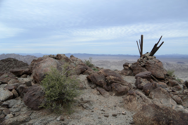 rocks and sand and sticks surveyors have left