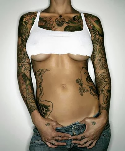 Tattooed breasts.