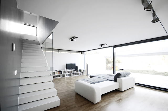 Minimal living room with white furniture 