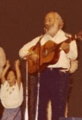 Miriam Drori dancing next to Shlomo Carlebach in concert