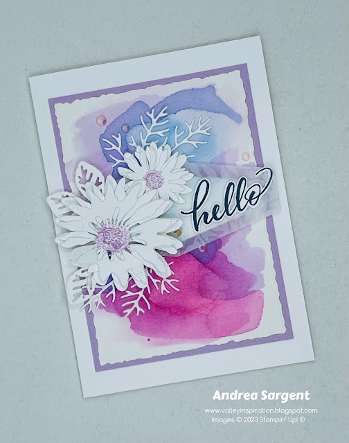 Water-colouring a colourful background with white daisies on top featuring Stampin’ Up!s Berry Burst creates a delightful card.