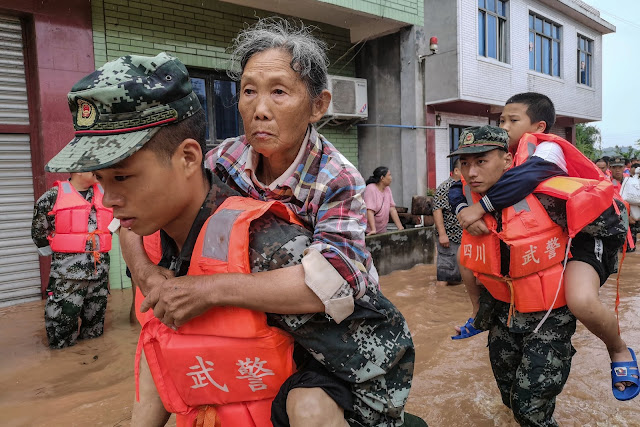 Residents being evacuated in Meishan in Sichuan Province. Xi Jinping, China’s leader, called the disaster relief efforts “a practical test of the leadership and command system of our army.”Credit...