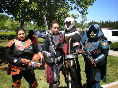 Four costumers depicting characters from the video game Destiny.