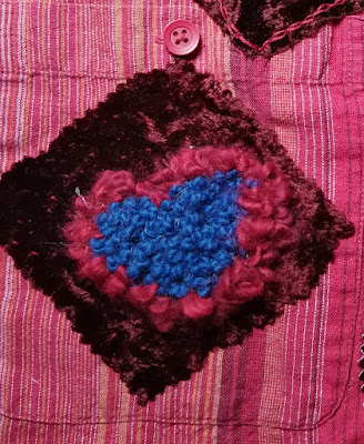 rug hooking inserted into reverse appliqué square