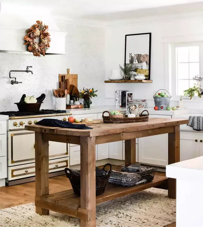 Rustic Wood Island on Rug in Kitchen