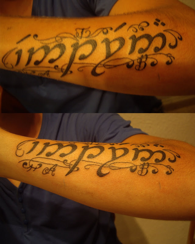 Tattoo antebrazo letras elficas. title=