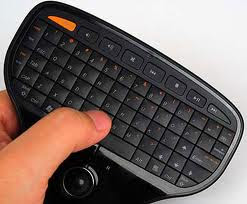 Un mini teclado con mouse y todo