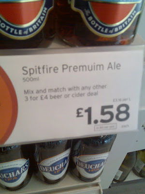 A supermarket price sign for Spitfire Premuim Ale