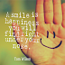 a smile is happiness you will find right under your nose.