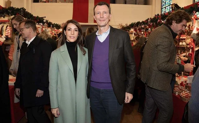 Princess Marie wore a turquoise blue wool coat by Max Mara, and turquoise blue wool trousers by Max Mara