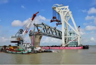 Padma Bridge ।।  বিশ্বের বহু দেশের মেধা এবং যন্ত্রপাতিতে দাঁড়াচ্ছে পদ্মা সেতু