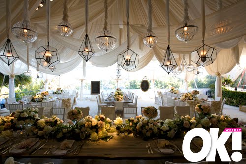 The reception took place under a Muslin tent which was draped over a wooden 
