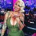 Amber Rose addresses her ethnicity, hints about being with a man with a lot of money