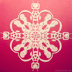 paper-cut snowflakes with highly detailed