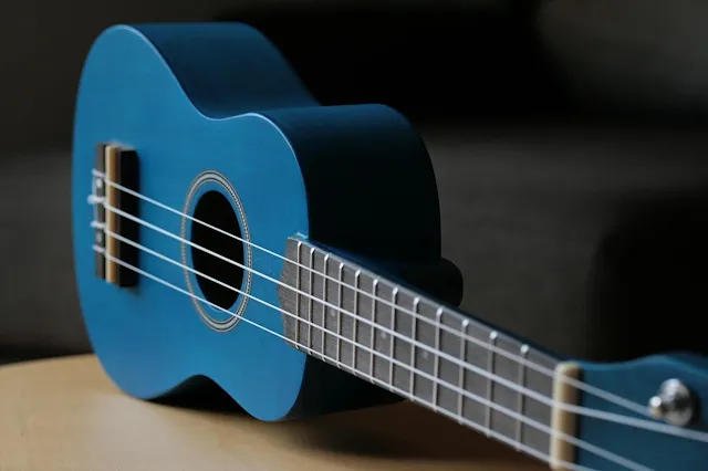A blue 50 cm ukulele