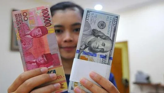 Terbaik Asia, Rupiah Ditutup Menguat ke Rp 14.052 Per Dolar AS