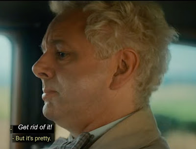 A screenshot of Aziraphale from the TV show Good Omens, with subtitles. Just his head is visible and he looks sad and pouty. The first subtitle has been edited to read "Get rid of it!" The second subtitle is unedited and reads "But it's pretty."