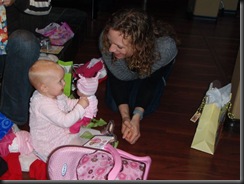 showing doll to mom