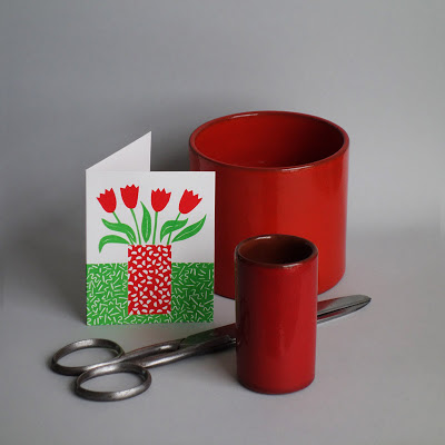 Silk-screened card, wallpaper sheers and red cylinder vases