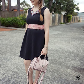 awayfromtheblue instagram black fit and flare dress pastel pink rebecca minkoff darren bag scarf as a belt