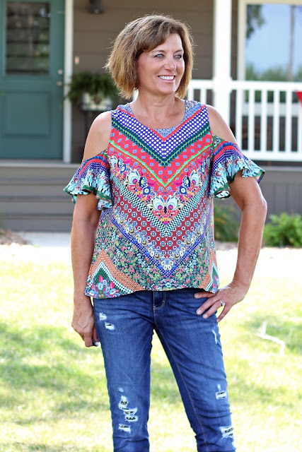 McCall's 7510 cold shoulder top made from a Mood Fabric's print