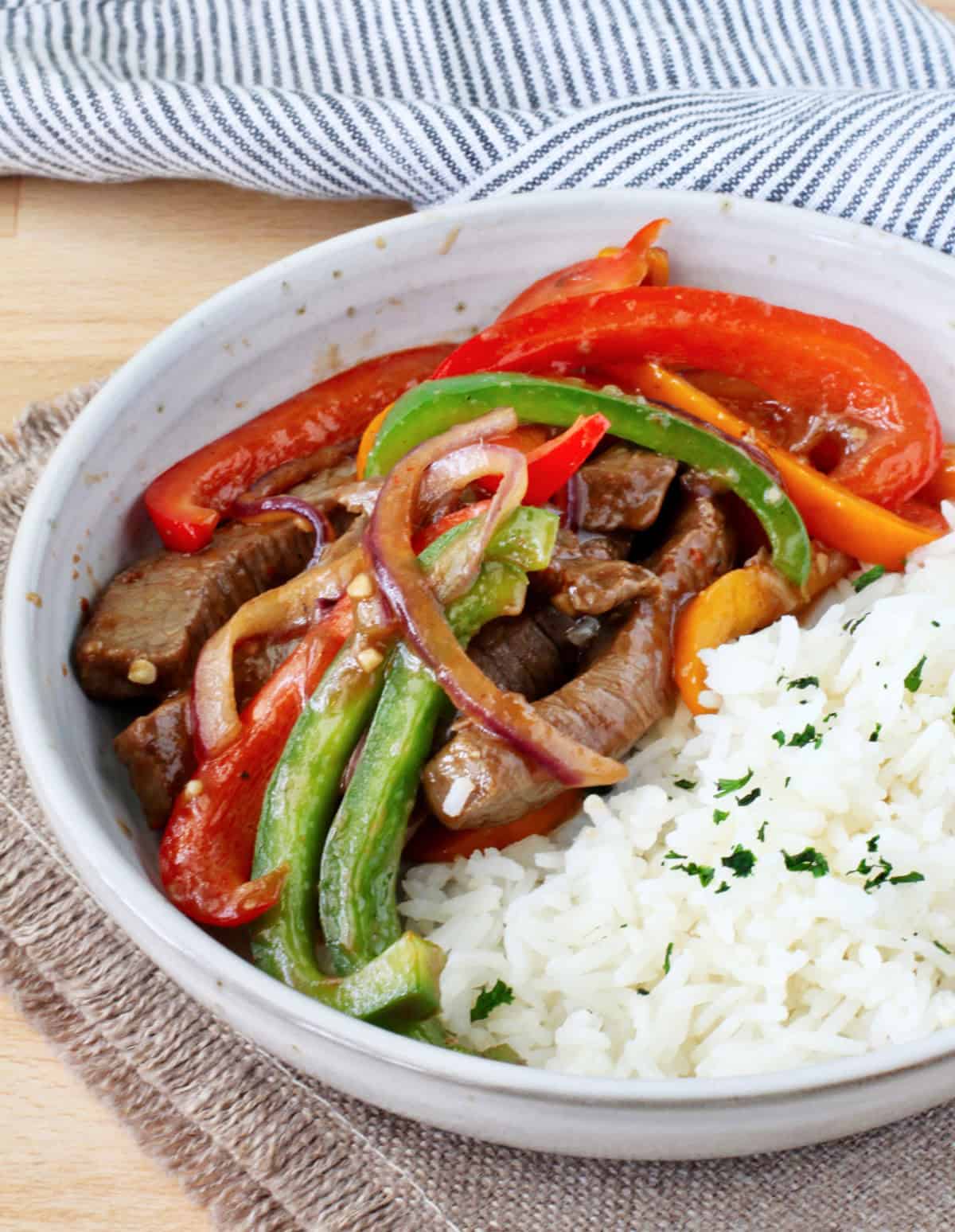 Hot Pepper Beef Stir-Fry with white rice in a bowl.