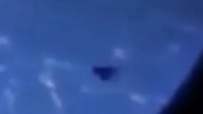 3 triangle shape UFOs caught by astronaut flying past the ISS.