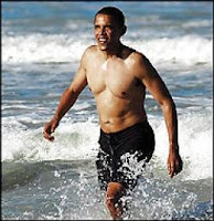 Barry Obama plays on the beach