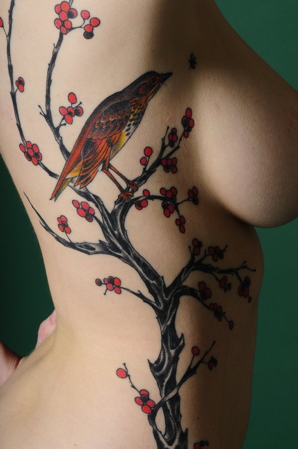 Pretty Bird tattoo on Breast Side Pretty Bird tattoo on Breast Side